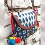 Pom Pom Sling Bag