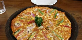 Relish An Appetizing Slice Of Pizza At Spezia Bistro, Delhi Pizza At Spezia Bistro